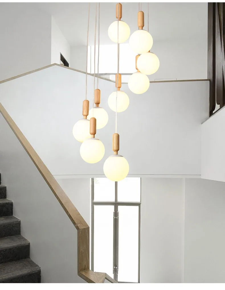 Modern Minimalist Chandelier — Duplex, High-Ceiling & Stairwell — view 9